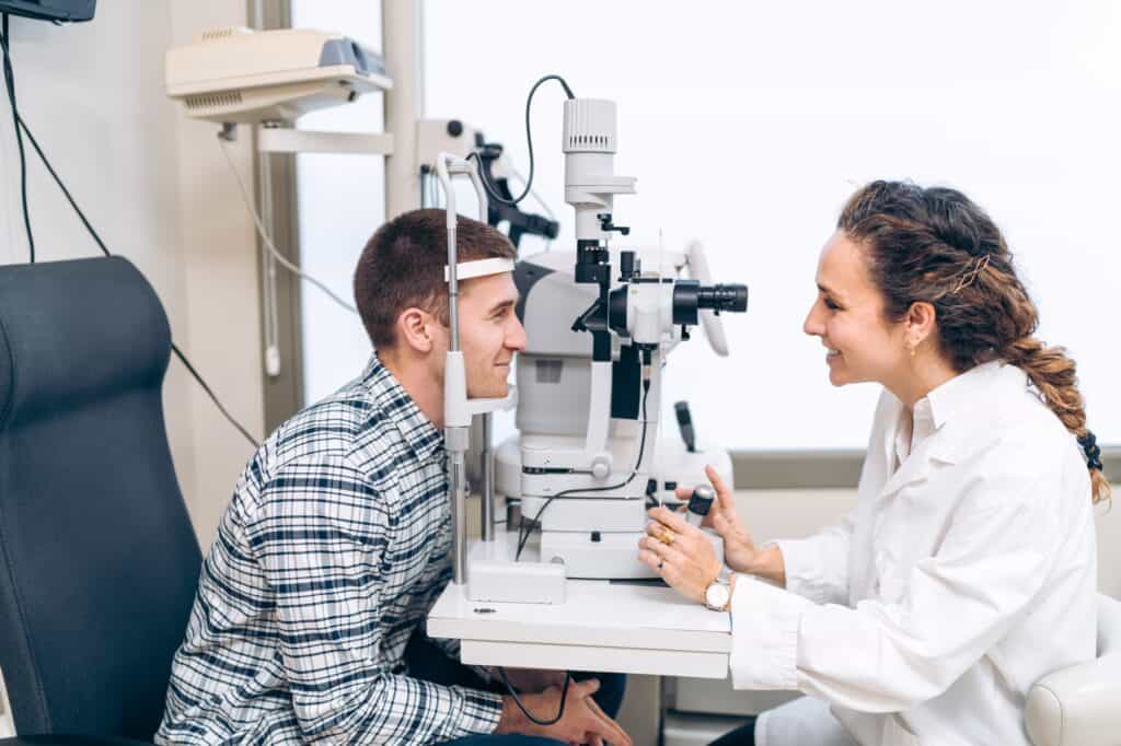 Patient and Ophthalmologist Engaged in Discussion During Eye Check